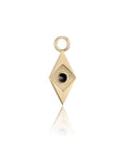 Gold pendant with a black gemstone on a white background