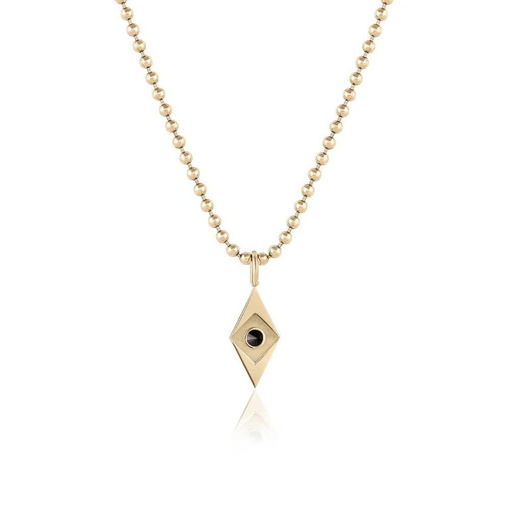 Gold necklace with diamond-shaped pendant on a white background