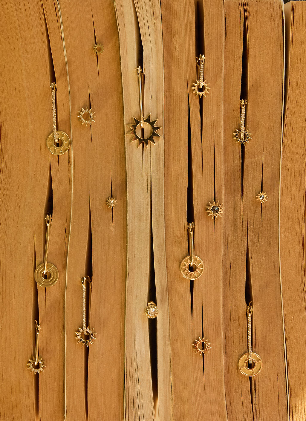 Still life of earrings in pages of a book